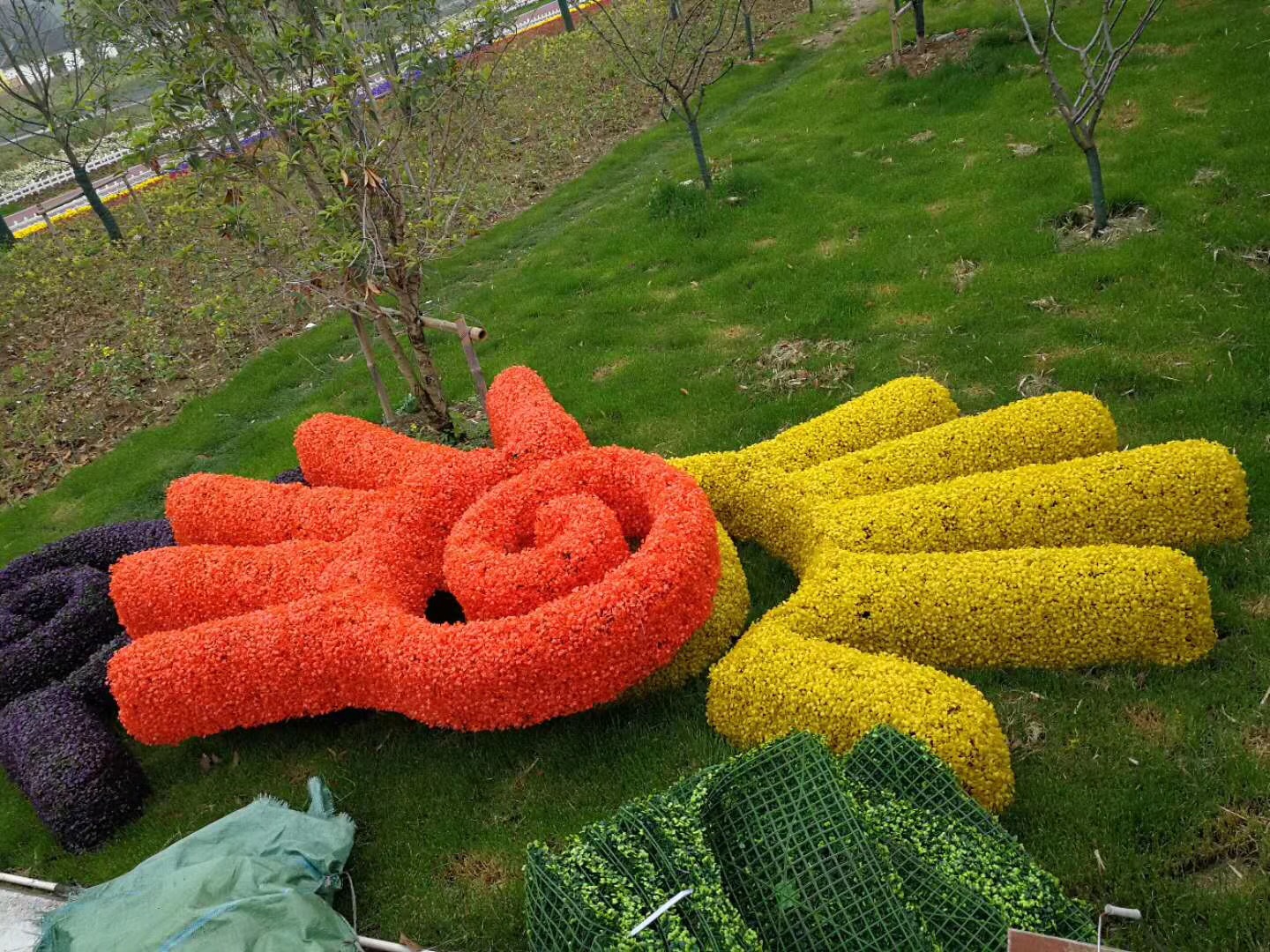 番禺节庆大象仿真绿雕设计